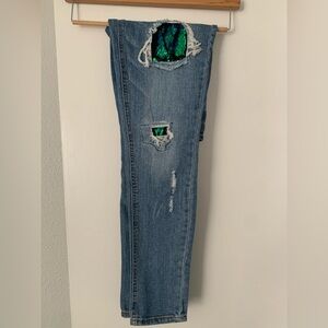 Almost Famous mid rise denim skinny jeans, sequin detail. Size 5